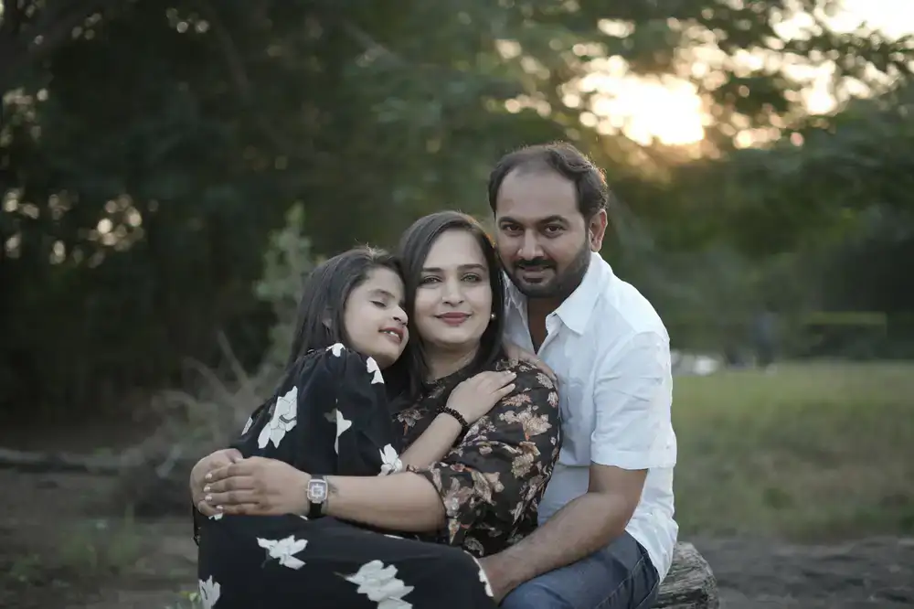 Smiling family portrait in natural light